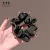 Elástico de Cabelo Scrunchie Bun Luxuoso, Moderno e Elegante para Mulheres 2025 Novo Alta Elasticidade Acessório de Cabelo Rabo de Cavalo Celebridade da Internet