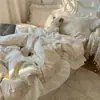 Juego de ropa de cama de cuatro piezas estilo blogger Ins, estilo coreano, con encaje de algodón y estampado floral pequeño, funda de edredón versión coreana, sábana bajera, ropa de cama