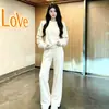 Conjunto deportivo casual estilo coreano para mujer, otoño e invierno, forrado de polar, elegante y de alta gama, adelgazante, moderno, corte holgado, sudadera de cuello redondo y pantalones largos