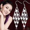 Pendientes elegantes Jiahui de cola de pavo real estilo coreano para mujer, largos y exagerados, con borlas plateadas.