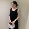 Tallas actualizadas: Conjunto elegante de top sin mangas de verano nuevo estilo coreano + falda con cinturón para mujer 2026