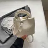 Bolsa de Design Exclusivo Bolsa Saco para Mulheres Verão 2026 Estilo Coreano Simples Versátil Bolsa de Ombro Tendência Casual Bolsa Transversal
