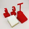 Accesorios para mostrador de exhibición de joyería: colgante de oro, soporte individual de terciopelo rojo, juego de joyería de plata, base para colgante de jade, hallazgos de oferta