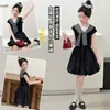 Vestido de Verano para Niña, Pequeño Vestido Negro Estilo Hepburn, Ajustado, Versión Delgada, Nuevo Vestido Chal Infantil de Moda 2026 para Niños Mayores