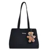 Bolso grande estilo universitario para mujer 2025 nueva moda versátil de un solo hombro simple para clase y desplazamientos bolso tote