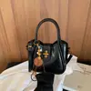 Bolso Transfronterizo Retro Chic para Mujer 2026 Nuevo Bolso Cubo de Moda Tendencia Bolso Casual para Viaje Diario de un Solo Hombro Cruzado