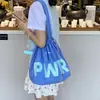 Bolsa de tela de nailon con cordón de nuevo diseño para verano, bolso de mano estilo perezoso, bolso de hombro para mujer para ir al trabajo, bolso de lona de gran capacidad