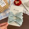 Novo prendedor de cabelo e elástico de cabelo com laço de tecido estilo coreano, feito à mão com um toque doce e sofisticado, para franja lateral e franja