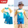 Nuevo traje de baño infantil para niños de Yuke, conjunto deportivo de dos piezas para niños de mediana edad, traje de baño de verano de alta gama con estampado de dibujos animados