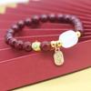 Guofeng imitación cinabrio bestia devoradora de oro familia de tres pulseras pulsera de transferencia del dios de la riqueza de cinco vías para hombres y mujeres regalo de este año