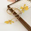 Pulseira de Punho Aberto Flor de Esmalte Retrô Europeia e Americana Novo Design de Cor 2026 Pulseira com Senso de Design Toque de Alto Padrão Joia de Mão