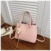Bolsa pequena de comércio exterior transfronteiriço feminina nova estilosa casual de mão tipo balde versátil para o dia a dia bolsa de ombro único transversal texturizada