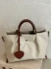 Bolso de Hombro Simple Shuai Mi Jia 2026 Nuevo Estilo Coreano Moderno Fresco Dulce Bolso de Mano para Viaje Casual Bolso Cruzado