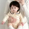 Enterizo estilo preppy para bebé niña 2026 nueva ropa infantil mameluco de manga larga mameluco de bebé estilo coreano