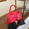 Bolsa de dor 2025, nova moda coreana, cor sólida, bolsa Boston portátil, design de nicho, bolsa de ombro transversal feminina