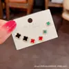 Moda luxo leve versátil requintado pequeno conjunto de brincos de tarraxa populares no TikTok celebridade online brincos de trevo brincos