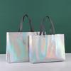 Nueva bolsa de mano con prensado en caliente láser, bolsa no tejida recubierta, bolsa de compras de alta gama, embalaje para tienda de ropa, bolsa de regalo al por mayor