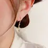 Aretes de hoja de ginkgo con incrustaciones de diamantes, temperamento, lujo ligero, brillantes, gota de aceite, ganchos para orejas exquisitos, versátiles, moda de nicho, aretes de alta gama para mujer