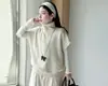 Nova coleção de outono e inverno para meninas: Colete de tricô com gola alta estilo coreano, conjunto versátil de segunda pele, calça pantalona e saia midi moderna para o final do outono