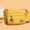 Bolso de mujer con textura de cuero suave, nuevo modelo 2026, simple y elegante, versátil, bolso para mamá, color liso, de hombro cruzado moderno para mujer