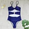 Traje de baño de una pieza sin tirantes para mujer 2026 Estilo nuevo Color sólido Hueco Triángulo Una pieza Falda pareo Aliexpress