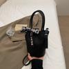 Bolso de Mano de Diseño Nicho Nuevo Bolso Balde para Mujer Moda Casual Color Puro 2025 Bolso de Hombro Personalizado de Primavera