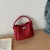 Bolso de mano de diseño nicho estilo coreano para mujer 2026 nuevo diseño transfronterizo bolso madre-hija bolso de hombro cruzado PU