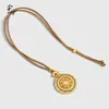 Mismo estilo que las joyerías, oro arenado, azul cian, incrustado con diamantes, giratorio, brújula Ruyi Ocho Tesoros calada, cadena para suéter, venta al por mayor de fábrica