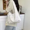 Bolsa de Lona Estilo Coreano Perezoso con Lazo de Gran Capacidad Modelo Nuevo 2026 Bolso de Hombro Tote Bolsa de Axila Versátil de Verano para Mujer