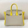 Bolso Togo de piel de vaca con bloques de color platino, bandolera de hombro de alta gama y estilo moderno para mujer, primavera y verano 2025