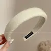 Faixa de cabeça larga de tricô minimalista e elegante estilo coreano para mulheres, novo modelo 2026, adequada para uso diário, projetada para realçar a aparência da linha do cabelo e pode ser usada como faixa de cabeça para lavar o rosto ou presilha de cabelo