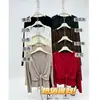 Moda Nicho Estilo Coreano Falso Dos Piezas Manga Larga Tejido Top para Mujer Elástico Adelgazante Favorecedor Temperamento Top Otoño C30943