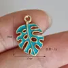 Accesorios para Joyería DIY de Aleación de Zinc Santa Claus y Muñeco de Nieve con Esmalte de Goteo Colgantes Pequeños Accesorios Materiales Fuente Fabricante Venta al por Mayor