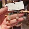 Pendientes Vintage Estilo Francés con Ojo de Gato Incrustado de Diamantes y Perlas, Pendientes de Lujo Ligero de Gama Alta, Exquisitos y Modernos Accesorios para Orejas Versátiles al por Mayor