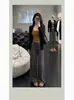 Otoño e invierno sexy chica caliente camisola ajustada para mujer cárdigan versátil adelgazante pantalones casuales de rayas negras conjunto de tres piezas para mujer