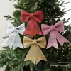 Nuevo colgante de lazo de plástico con purpurina de Navidad para crear una atmósfera festiva, adecuado para escaparates de casas y decoraciones de árboles de Navidad