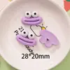 Dibujos animados creativos tridimensionales boca de salchicha ojos feos lindos accesorios hechos a mano de resina material de pinza de pelo de pegamento de crema de caca al por mayor