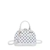 Bolsa de mão feminina de nicho estilo coreano, novo modelo de verão 2026, bolsa concha estilosa e simples, bolsa transversal elegante e fashion