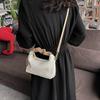 Bolso de mano de rayas verticales texturizadas 2023 nuevo diseño de nicho bolso de hombro cruzado estilo extranjero todo-partido para mujer venta al por mayor