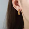 Pendientes retro europeos y americanos de bola de acero en forma de U, no se decoloran, titanio, oro de 18k, temperamento de hada, personalidad, nicho, pendientes al por mayor