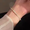 Pulsera de Aleación con Diamantes Completos de Trébol de Cuatro Hojas para Mujer, Estilo Ins, Lujo Ligero, Sensación de Alta Gama, Pulsera Exquisita de Nicho, Joyería de Mano Versátil Personalizada