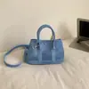 Bolso de Mano de Diseño de Moda de Nicho para Mujer 2026 Nuevo Estilo Coreano Bolso Cubo para Viajes Diarios Bolso de Hombro Único Cruzado Transfronterizo
