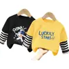 Ropa para niños para niños, camiseta de manga larga de retazos, imitación de dos piezas, camiseta base de algodón puro para niños mayores, nuevo estilo de top para primavera y otoño 2026