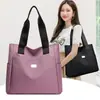 Bolso tote grande de tela Oxford para mujer 2026 nuevo, estilo simple para ir al trabajo, bolso de hombro multibolsillo, al por mayor