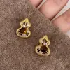 Pendientes vintage Maillard de otoño e invierno para mujer, nuevo modelo popular 2026, diseño de nicho, pendientes con sensación elegante y de alta gama