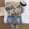 Conjunto de Verano para Bebé Niño 2026 Nueva Ropa Infantil Niños Verano Letra Manga Corta Atractivo Conjunto de Dos Piezas Moderno Venta al por Mayor