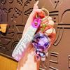 Astronauta Jelly Bean Botella Flotante Colgante para Mochila Astronauta de Dibujos Animados Llavero para Coche Regalo Pequeño para Pareja Venta al Mayoreo
