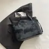 Bolsos de Gran Capacidad para Mujer Primavera y Verano 2026 Nueva Moda Bolso de Hombro para Viajes de Negocios Bolso Tote Cubo de Mano de Alto Valor