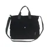 Bolsa de Ombro para Mulheres e Homens 2026 Nova Moda Nicho Cor Sólida Bolsa de Aula para Estudantes Grande Capacidade Lona Casual Bolsa Transversal