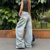 Jeans de guadaña retro americanos para mujer, nuevo diseño verano 2026, pantalones de guadaña holgados rectos de pierna ancha hasta el suelo
